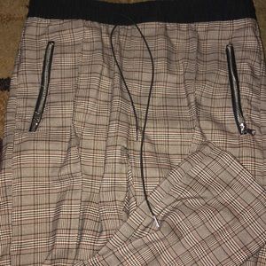 Plaid pants. Tan. Zipper pockets.